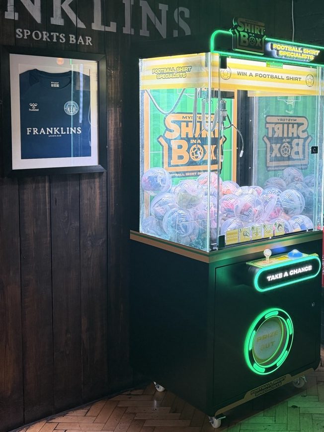 A Shirt in a Box claw machine in Franklins Sports Bar